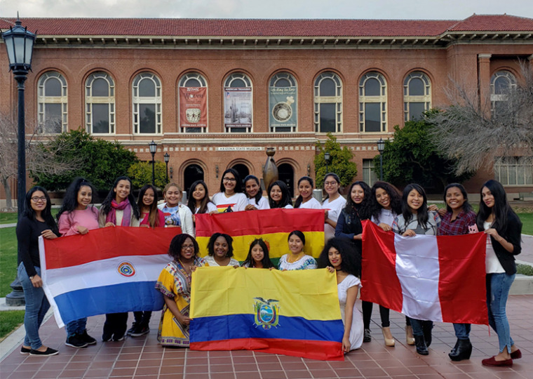 Students in the SUSI Leadership Institute on the UA Campus with flags from their home countries